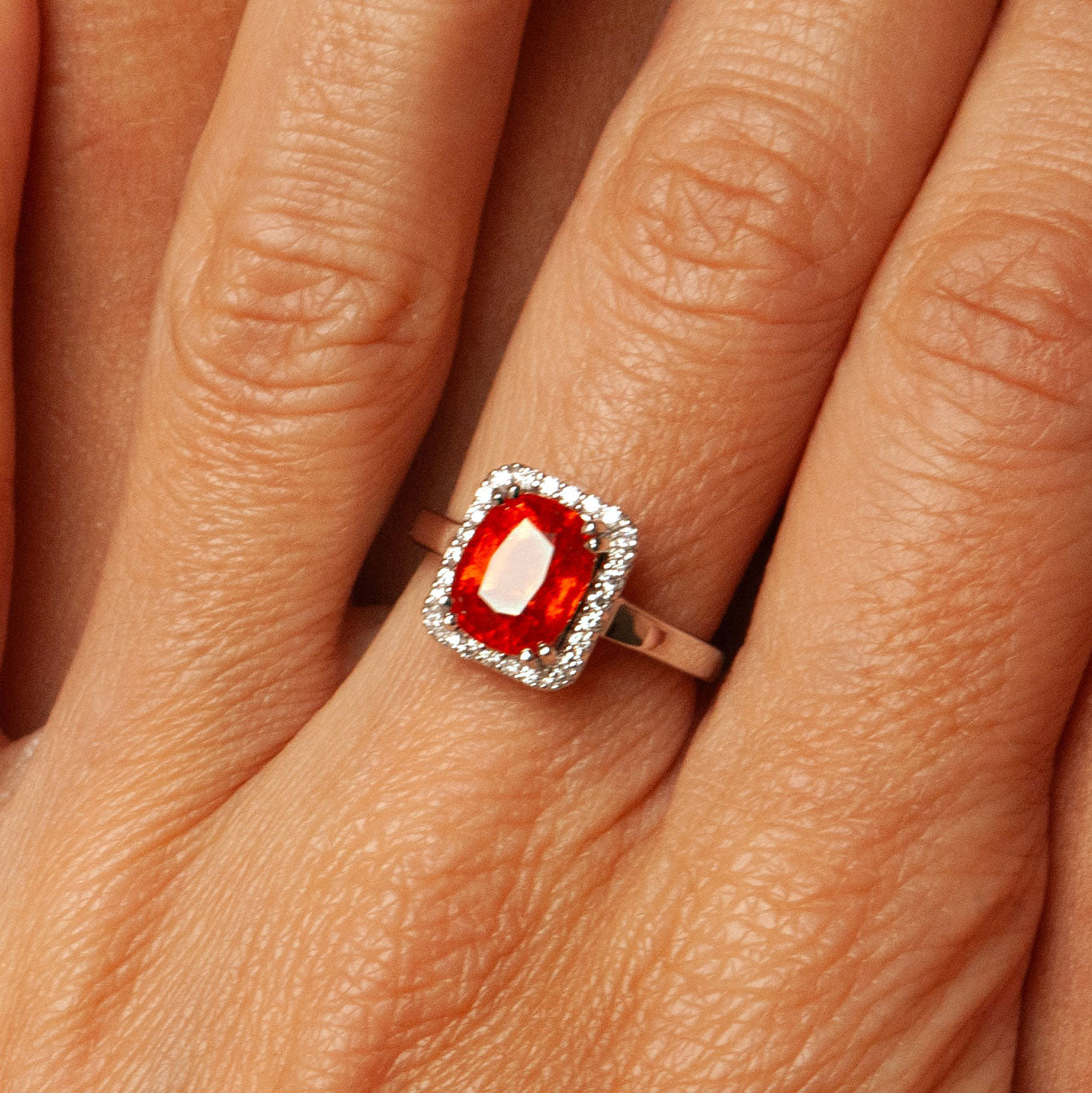 “Simone” Gold Ring, garnet and diamonds