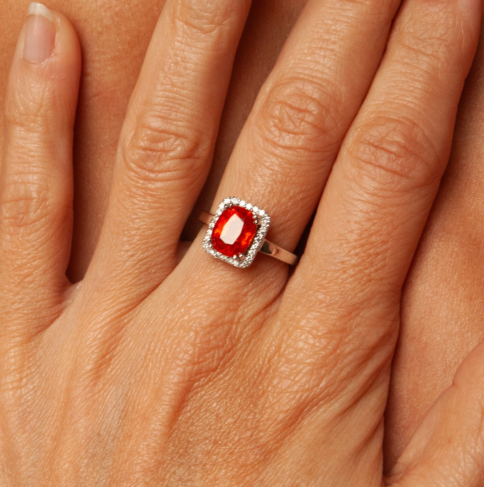 “Simone” Gold Ring, garnet and diamonds